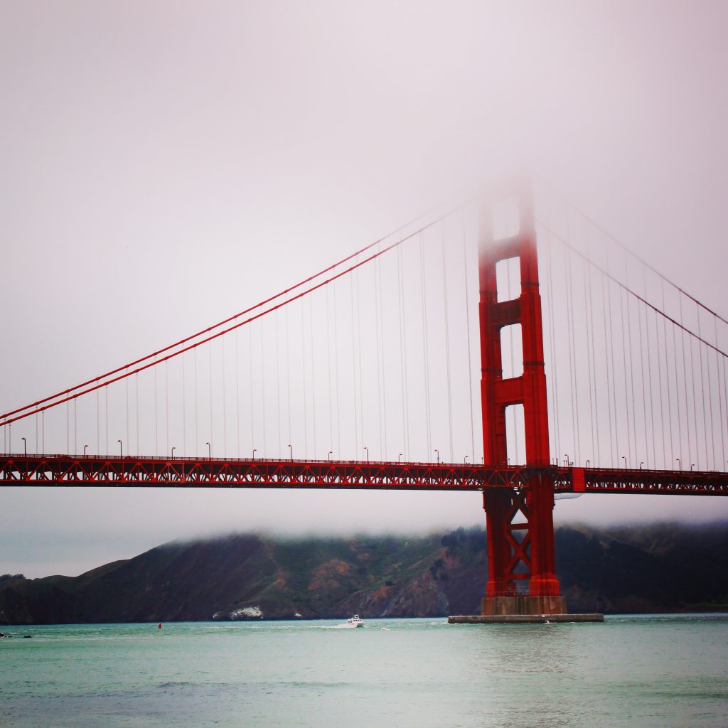 Golden Gate bridge seen through the fog - reasons to visit California and California road trip in photos.
