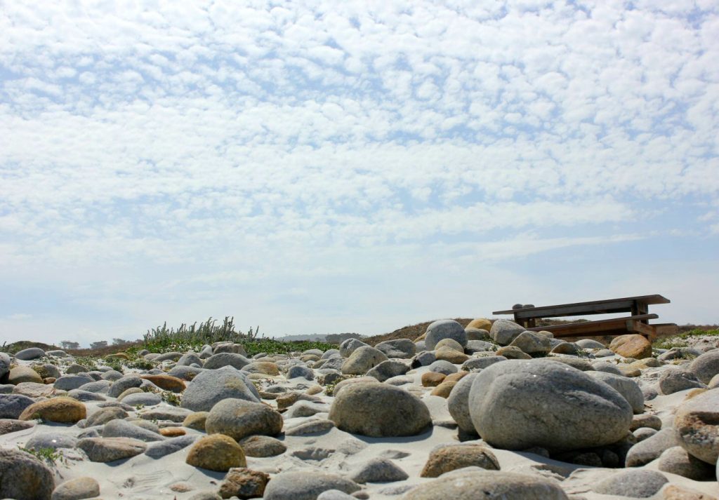 Stones on the beach under a blue sky - my Pacific Coast Highway pictures and reasons to visit California