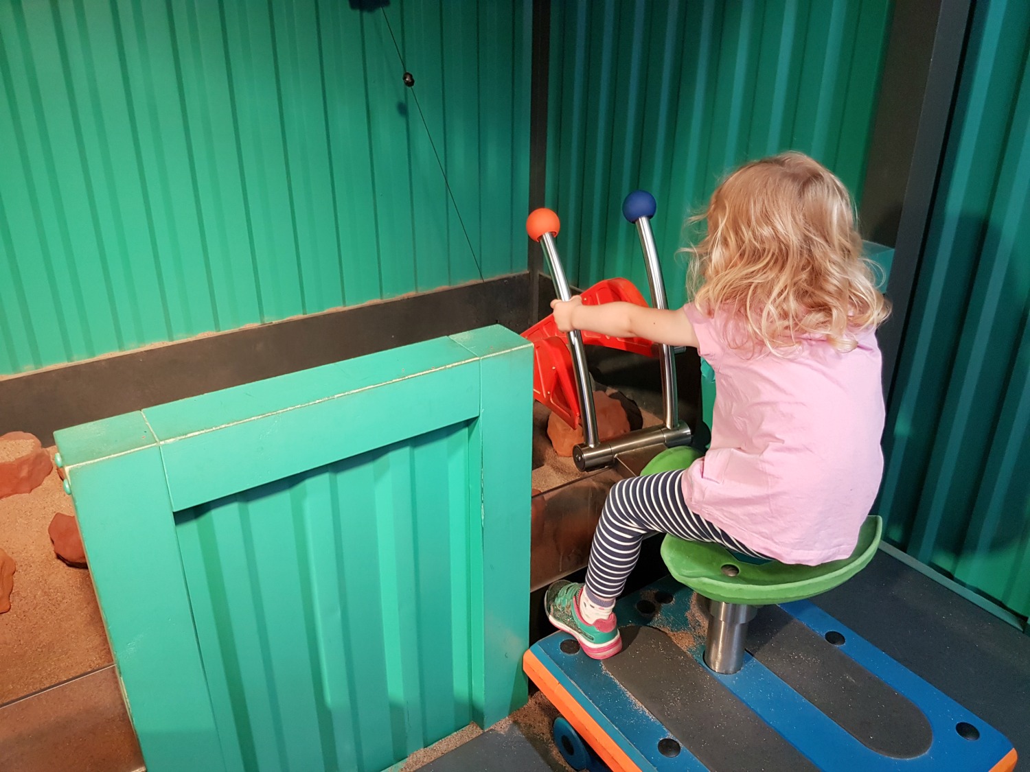 My daughter at the controls in the Bob the Builder section of Mattel Play, one of the main Albert Dock kids attractions