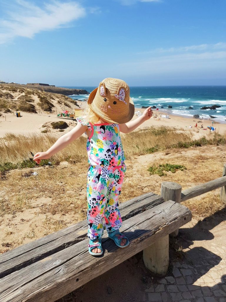 Turning up the colour and fun with some matching bright outfits for a summer holiday or day at the beach from George At Asda - my daughter in Porgual, in printed jumpsuit for the #GeorgeMiniMe challenge
