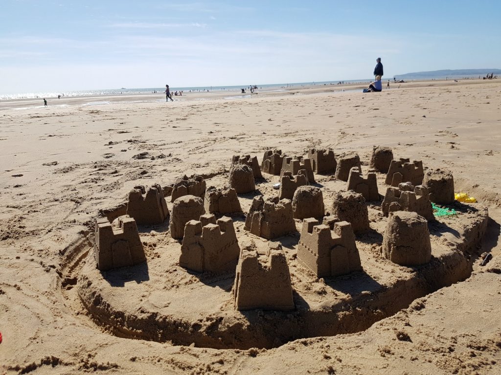 sandcastles on Camber Sands beach in East Sussex - spending a weekend in East Sussex with my daughter before the start of school, to explore the history and coastline