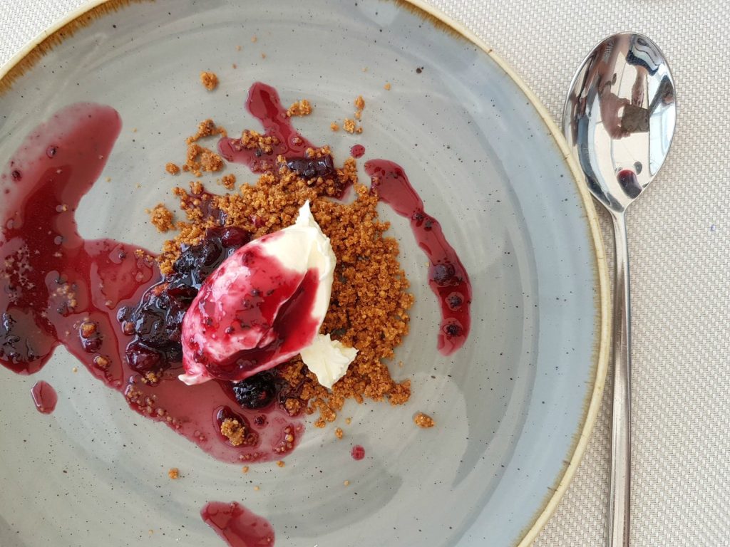 View of dessert with fruit and cream on the Costa Barcelona - one of 13 reasons to visit Costa Barcelona with kids