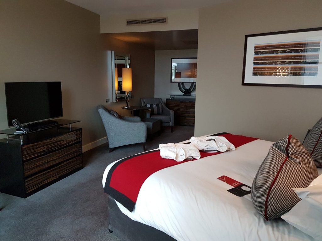 View of the bedroom including bed and sitting area in our suite at Brooklands Hotel - my review of our stay at Brooklands Hotel with kids