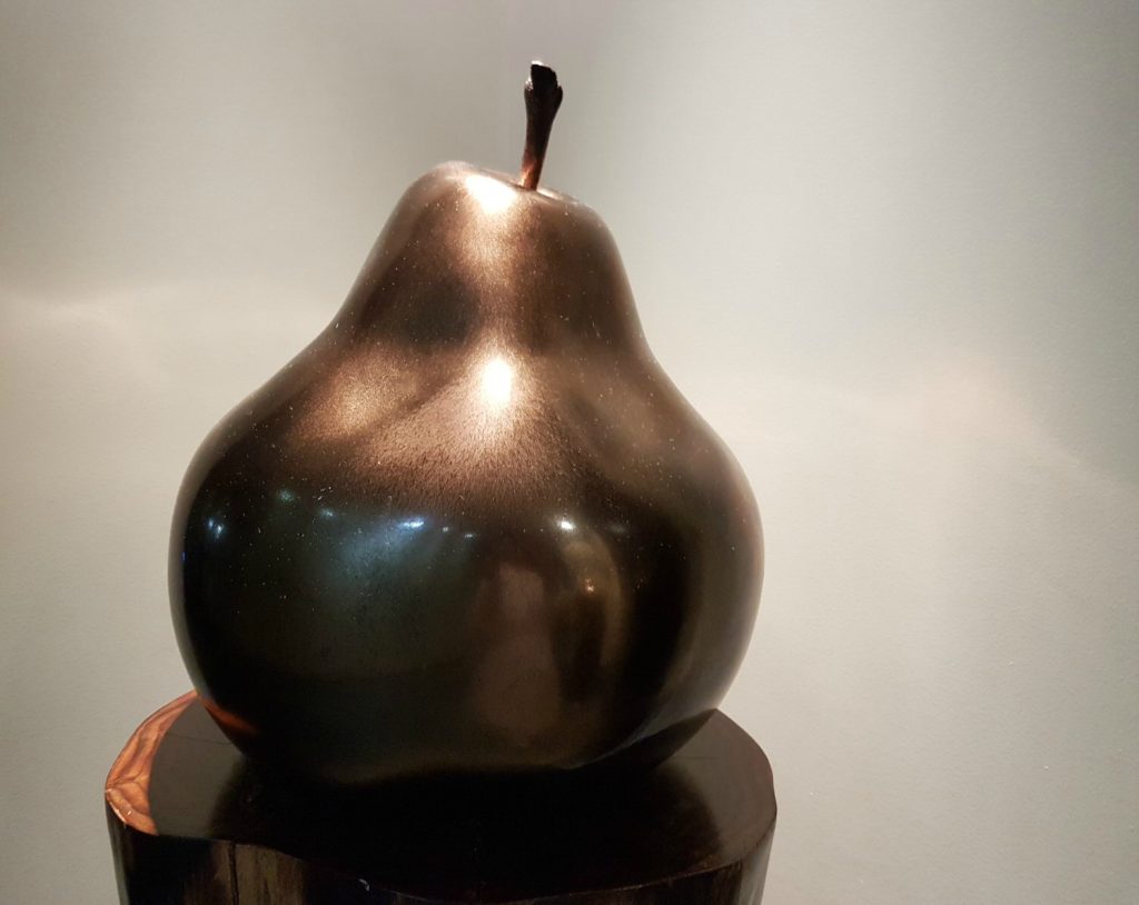 A huge golden pear sculpture outside the changing rooms for the spa at Brooklands Hotel, Surrey - my review of our stay at Brooklands Hotel with kids