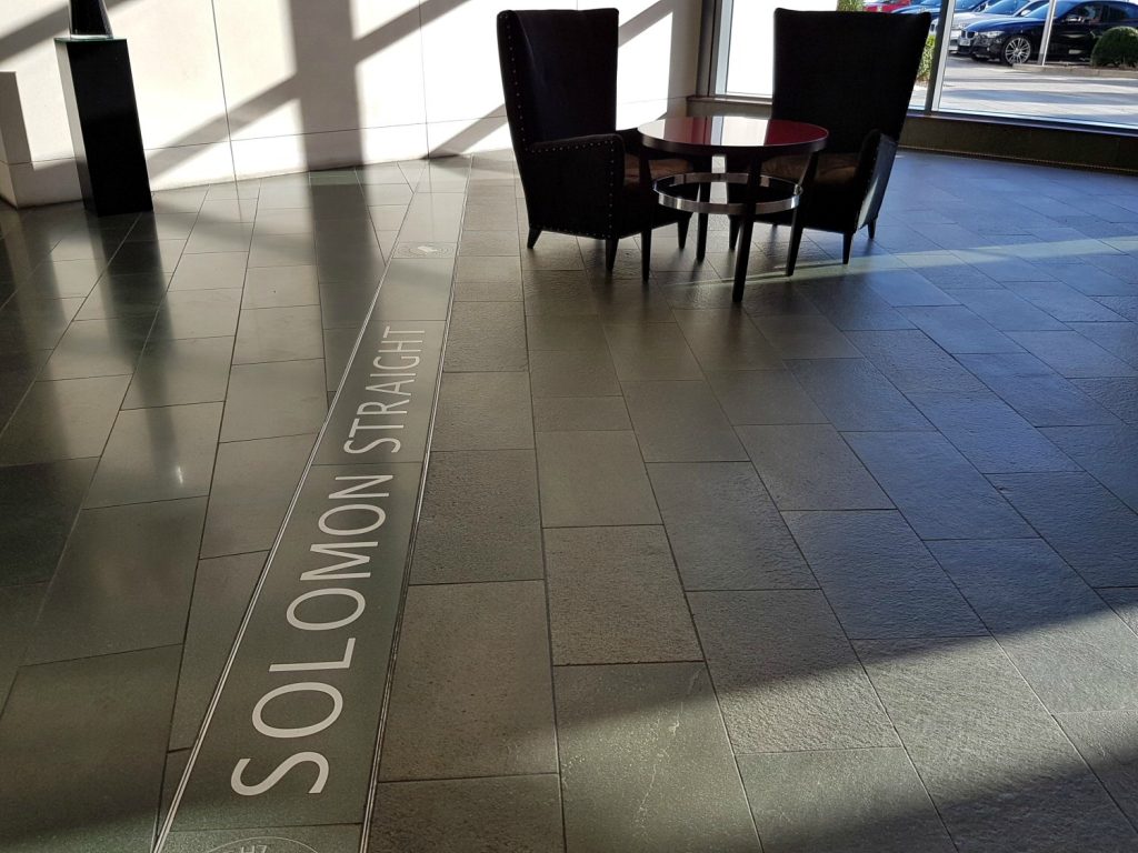 Markings showing the old Solomon Straight on the Brooklands race circuit, now in the lobby of the Brooklands Hotel - my review of our stay at Brooklands Hotel with kids