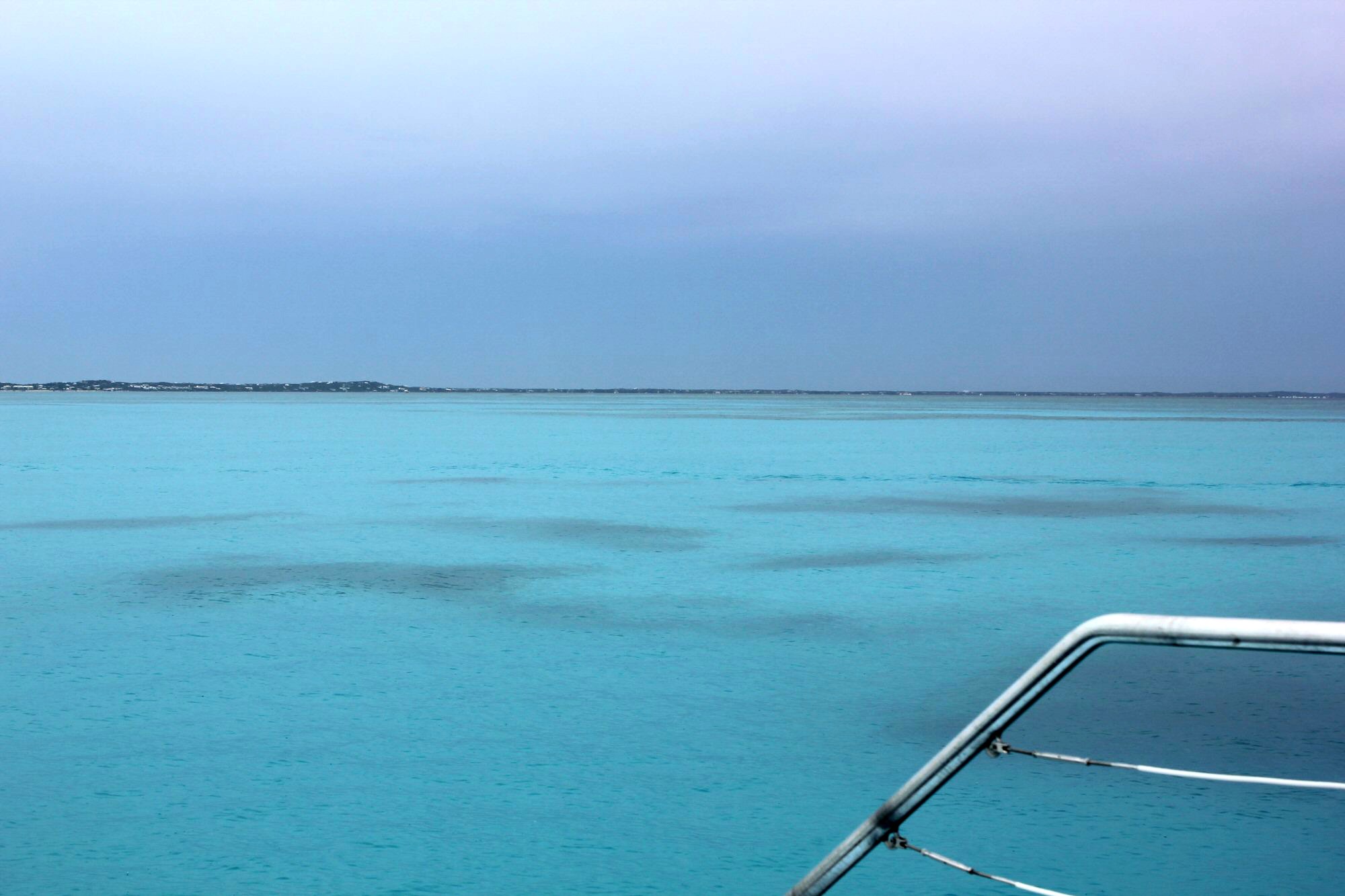 View of the turquoise Caribbean on a cloudy day off Providenciales in the Turks & Caicos islands