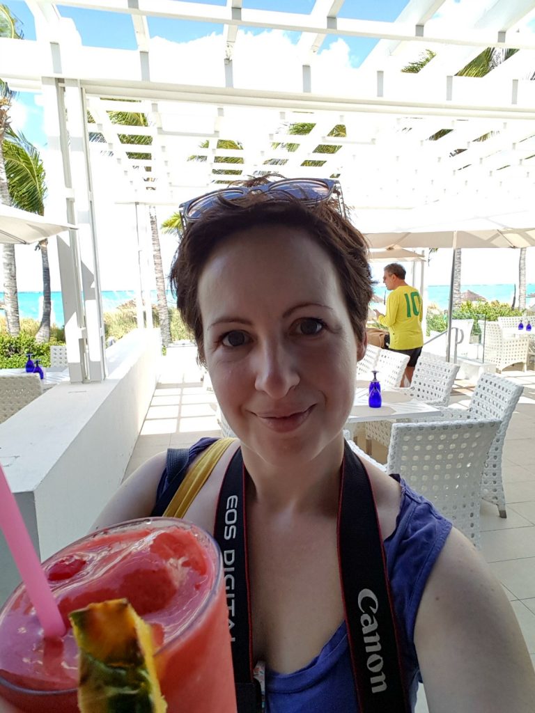 Me with a strawberry daiquiri - one of my 9 top reasons to visit Beaches Turks & Caicos with kids