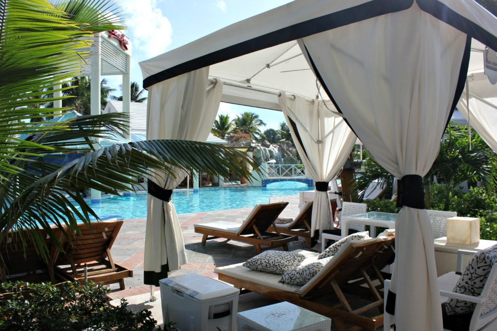 Looking through the cabanas onto one of the pools - one of my 9 top reasons to visit Beaches Turks & Caicos with kids