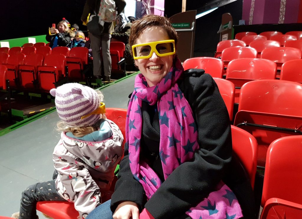 Wearing 3D glasses with my daughter before the 3D sleigh ride film at Willows Activity Farm Santa Spectacular near St Albans in Hertfordshire - my review of our family day out