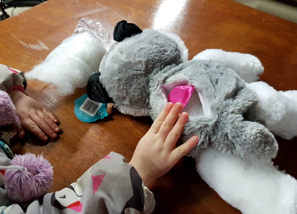 Making our own husky complete with pink heart at Willows Activity Farm Santa Spectacular near St Albans in Hertfordshire - my review of our family day out