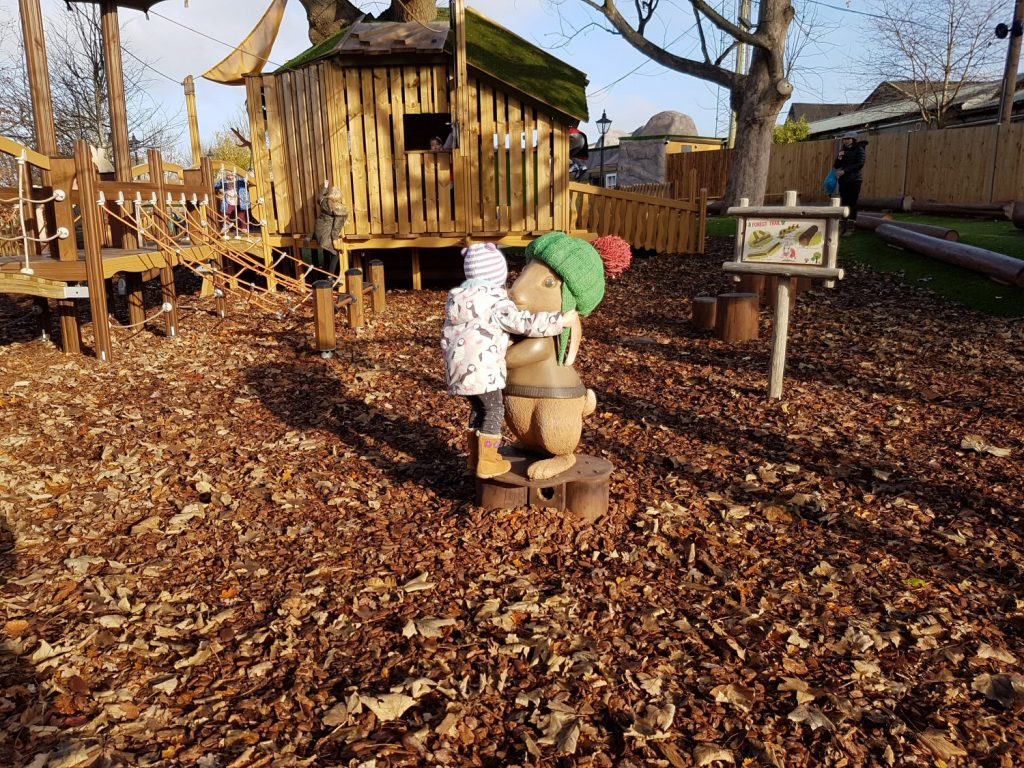 My daughter cuddled Benjamin Bunny in Peter Rabbit's adventure playground at Willows Activity Farm Santa Spectacular near St Albans in Hertfordshire - my review of our family day out