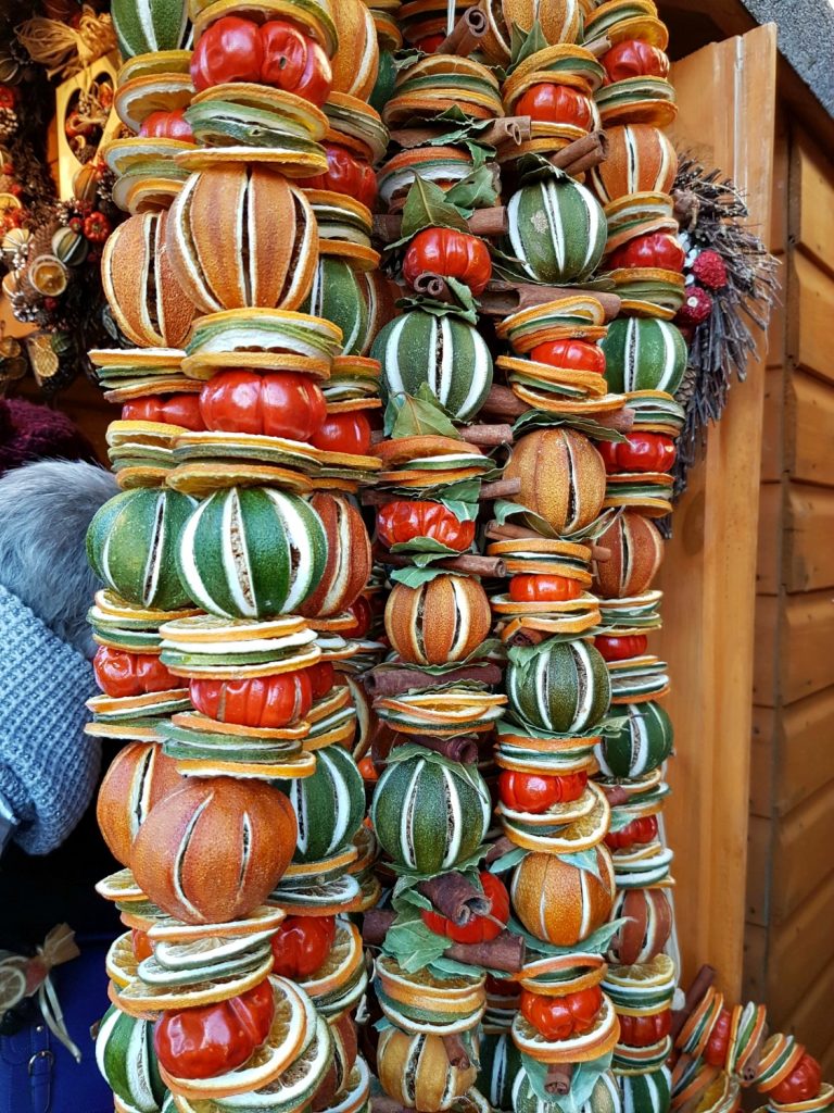 Natural wreath and decorations made from dried oranges and limes - our visit Winchester Christmas market with kids