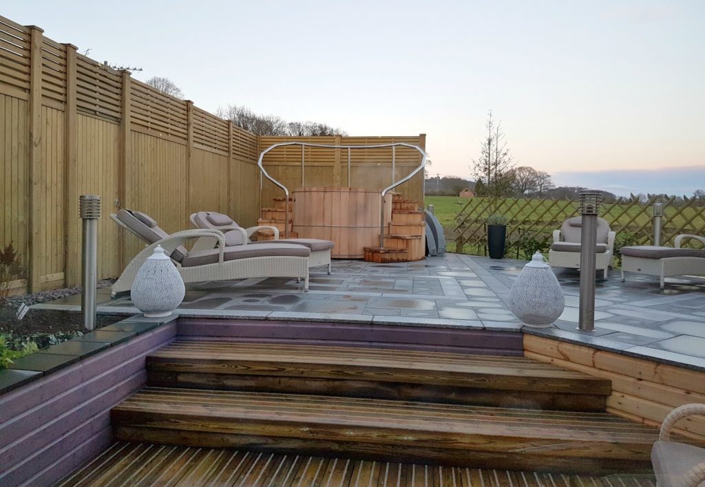 Hot tub outside the spa at Fishmore Hall in Shropshire, UK
