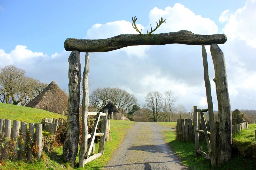 The antler-topped gateway to Castell Henllys Iron Age village in Wales - one of my three top days out in Pembrokeshire with kids