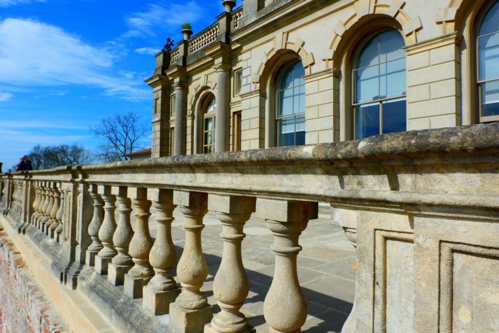 The golden stone of the terrace at Cliveden against a blue sky - a day out in photos testing my Fujifilm X-A3 mirrorless camera