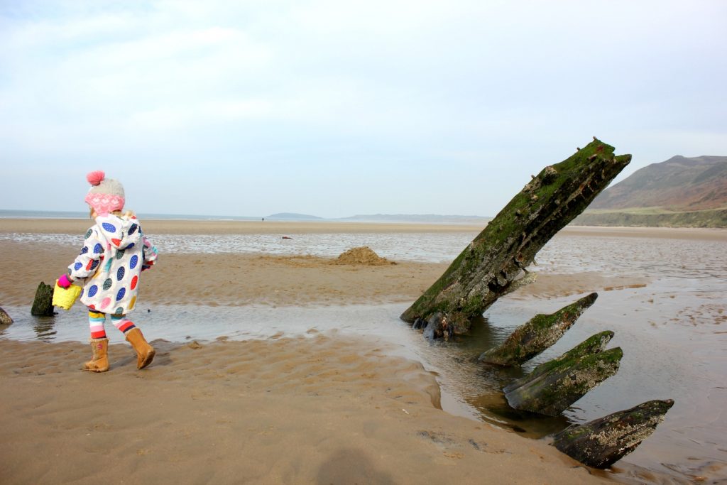 The wreck on Rhossili Beach in Wales - on our journey to discover Welsh legends