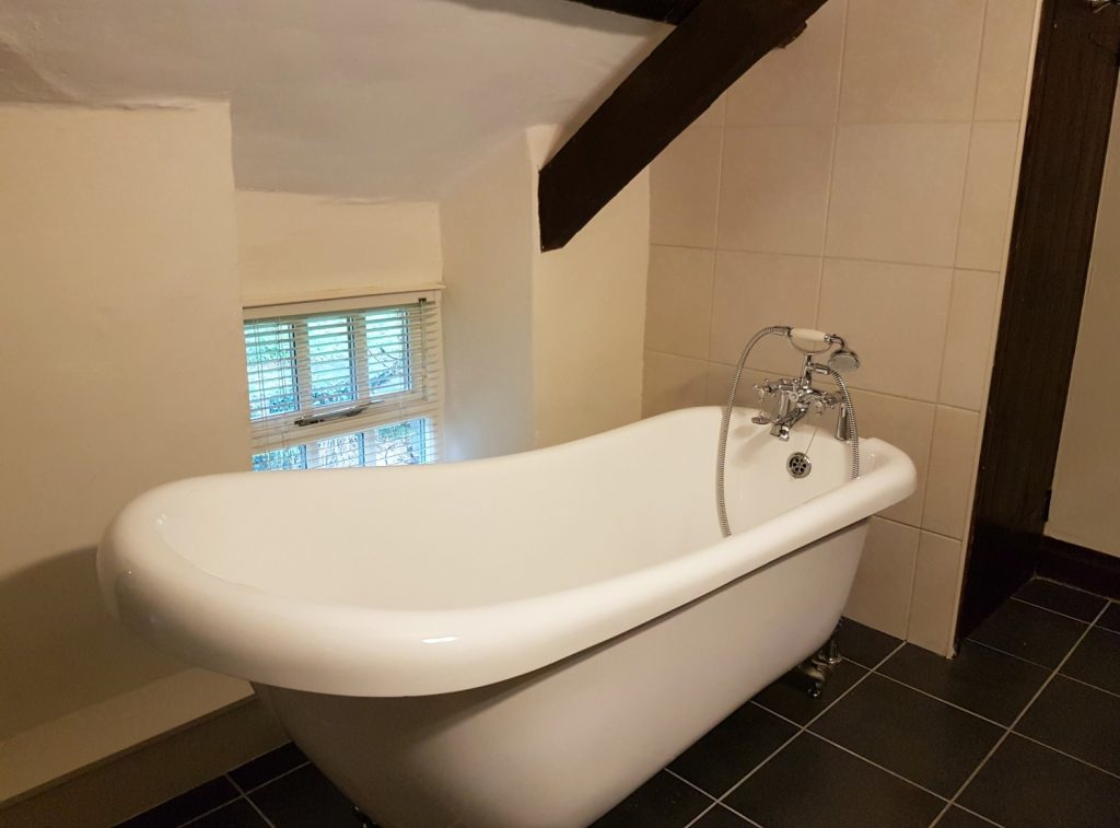 The huge bath at at Clydey Cottages Pembrokeshire in Wales - my review of our stay at this family-friendly holiday cottage