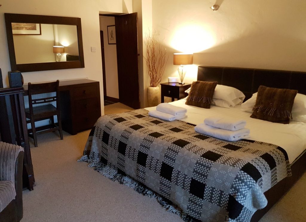 Our comfortable double bed at Clydey Cottages Pembrokeshire in Wales - my review of our stay at this family-friendly holiday cottage