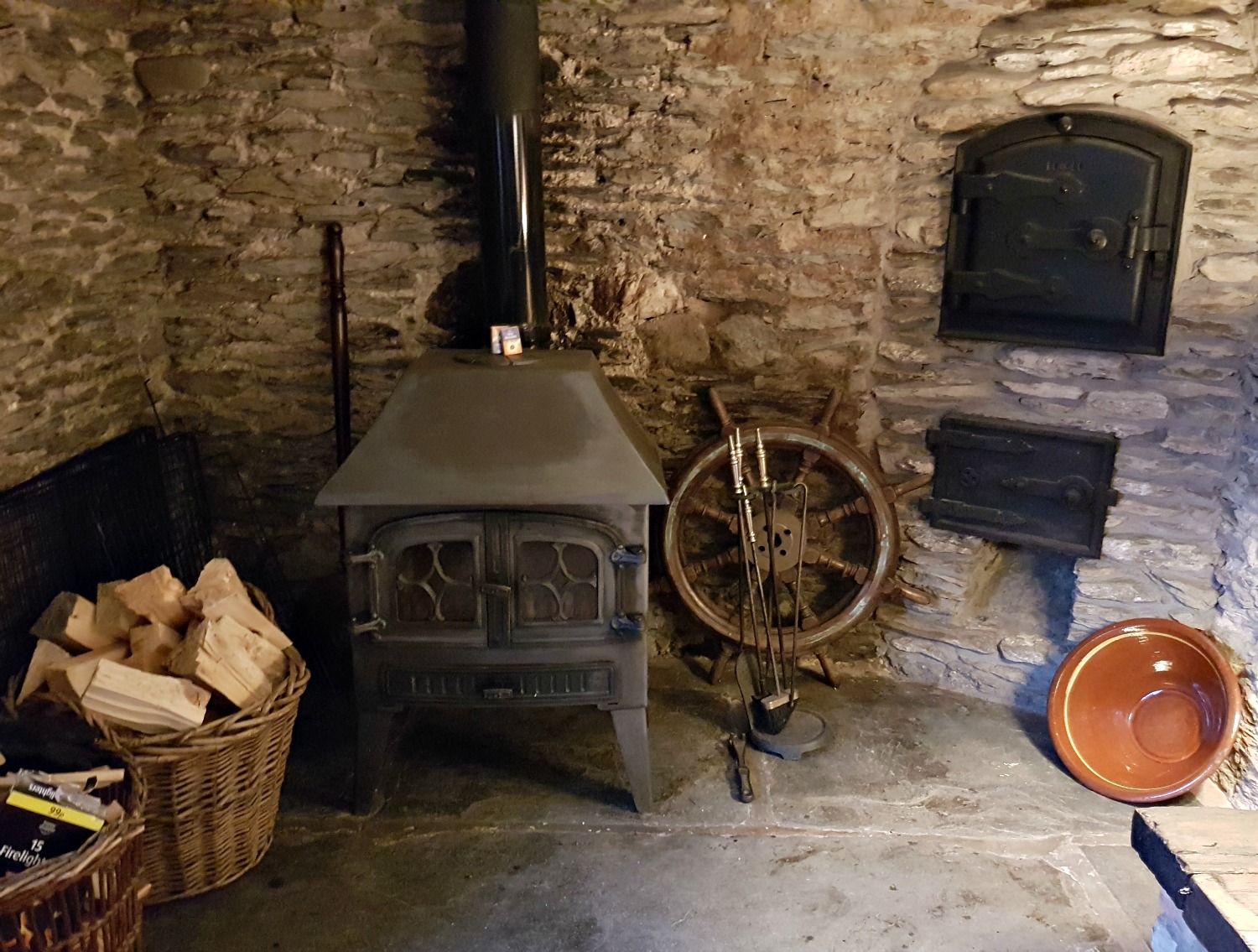 The wood burner in Ivy Cottage at Clydey Cottages Pembrokeshire in Wales - my Clydey Cottages review, after our stay at this family-friendly holiday cottage