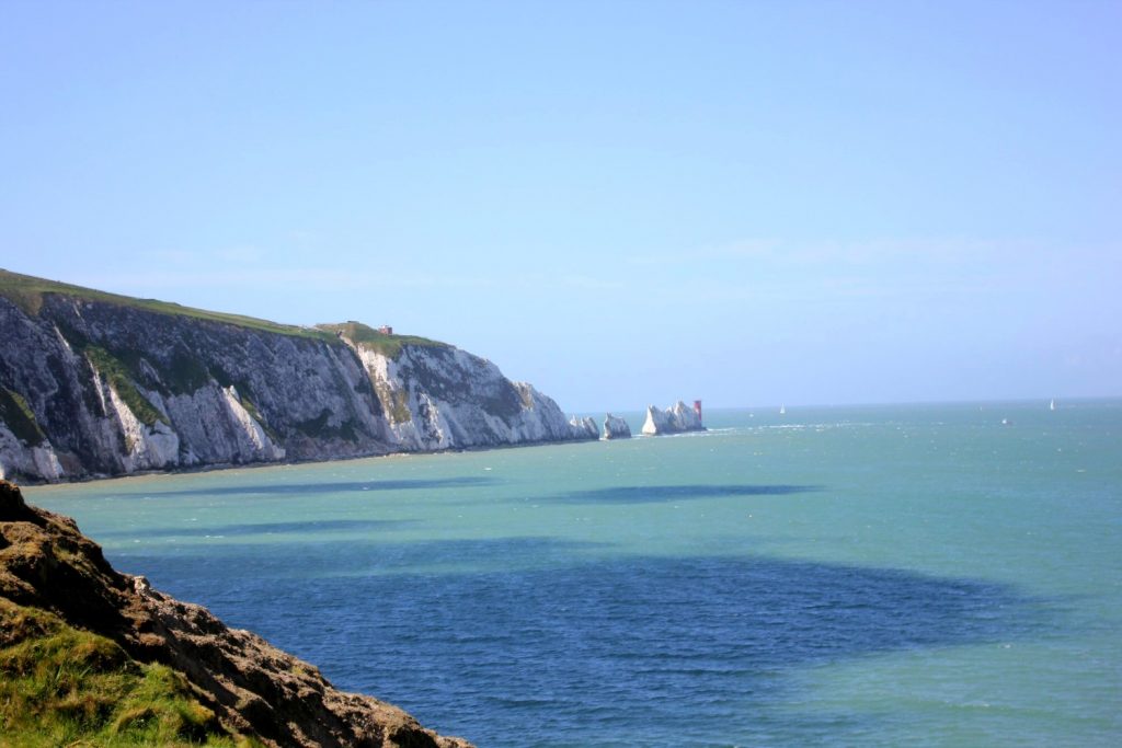 A view down onto Alum Bay and the turquoise sea, looking out to The Needles - discovering the Isle of Wight coast