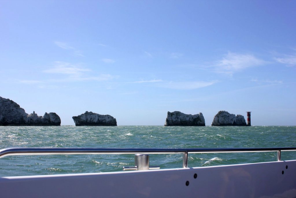 A view onto the turquoise sea, looking out to The Needles from our boat - discovering the Isle of Wight coast