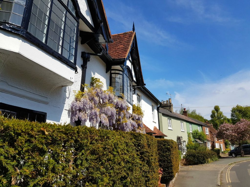 Flowers blooming on the pretty old houses in Great Missdenden, along the village trail - my Roald Dahl Museum review