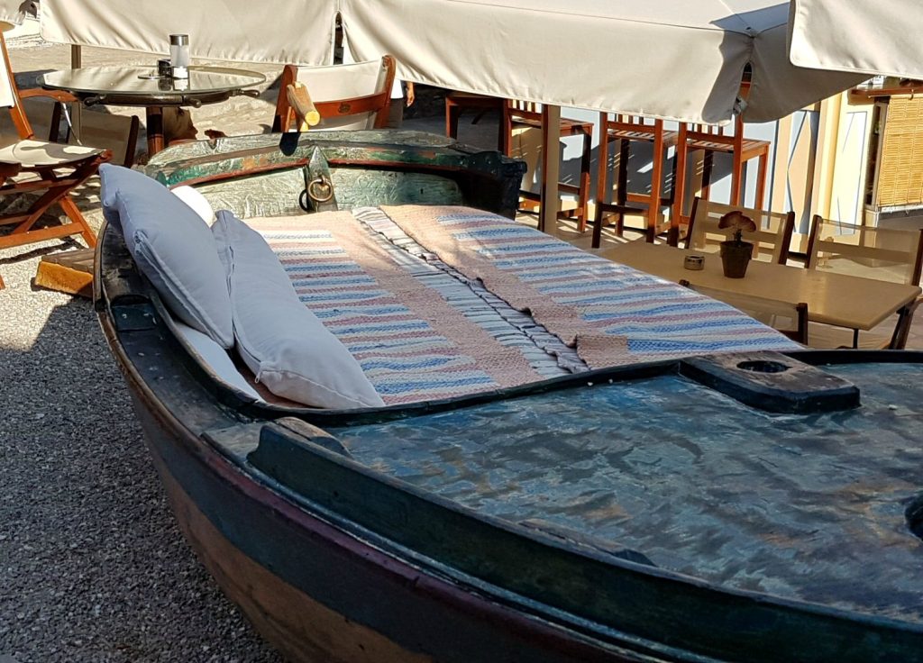 A boat turned into a day bed at Iapetos Village on Symi in Greece - my Iapetos Village Symi review