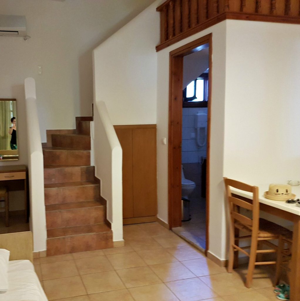 Stairs up to the bedroom at Iapetos Village on Symi in Greece - my Iapetos Village Symi review