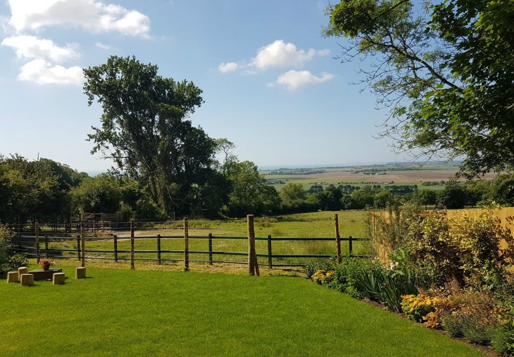 A view down the garden to the rhino paddock - my Rhino Lodge Port Lympne review