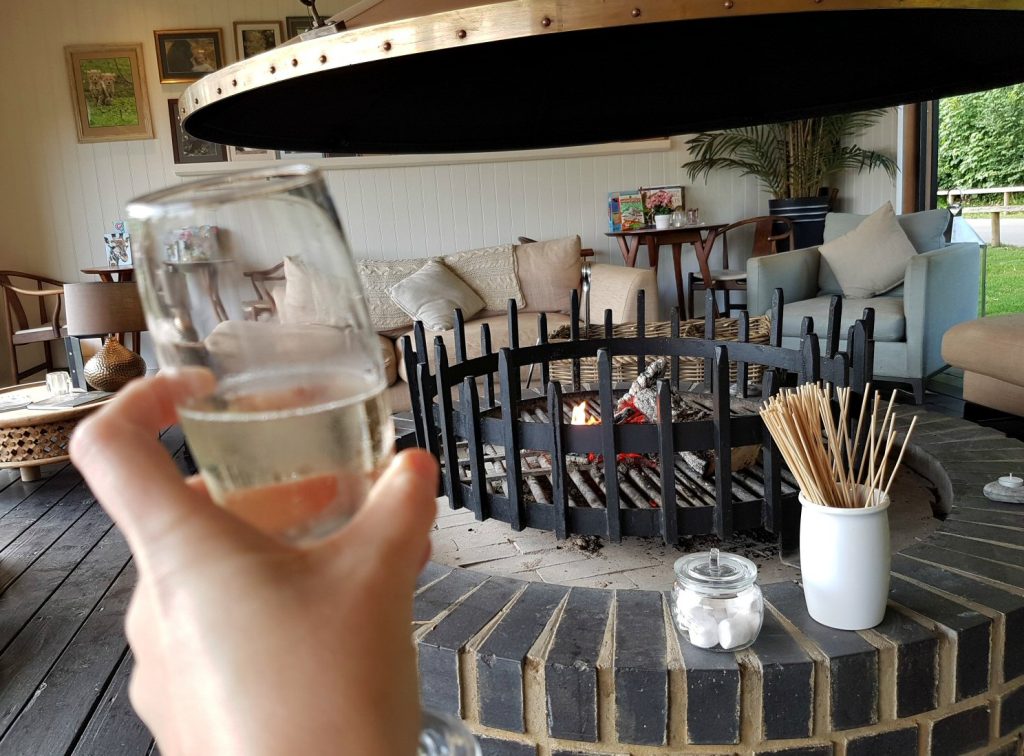 A welcome glass of prosecco at the Clubhouse - my Rhino Lodge Port Lympne review