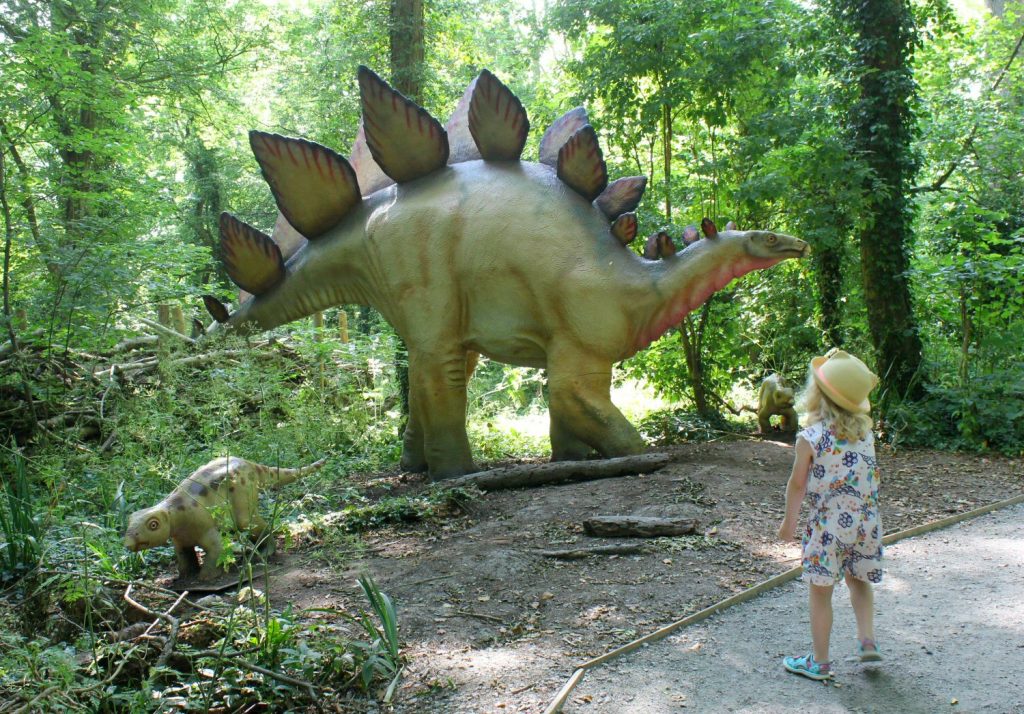 My daughter with stegosaurus - my Rhino Lodge Port Lympne review