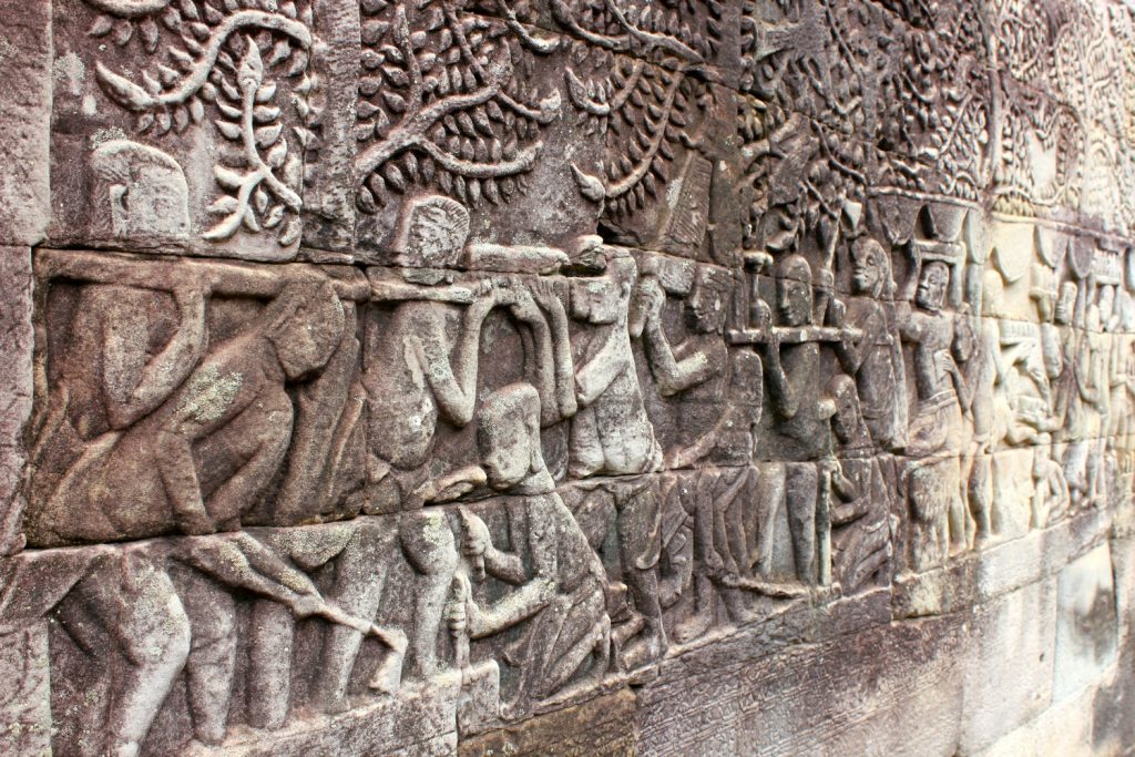 One of the intricately carved reliefs of the Angkor temples in Cambodia, this at Bayon - one of the temples I visited in Angkor with kids