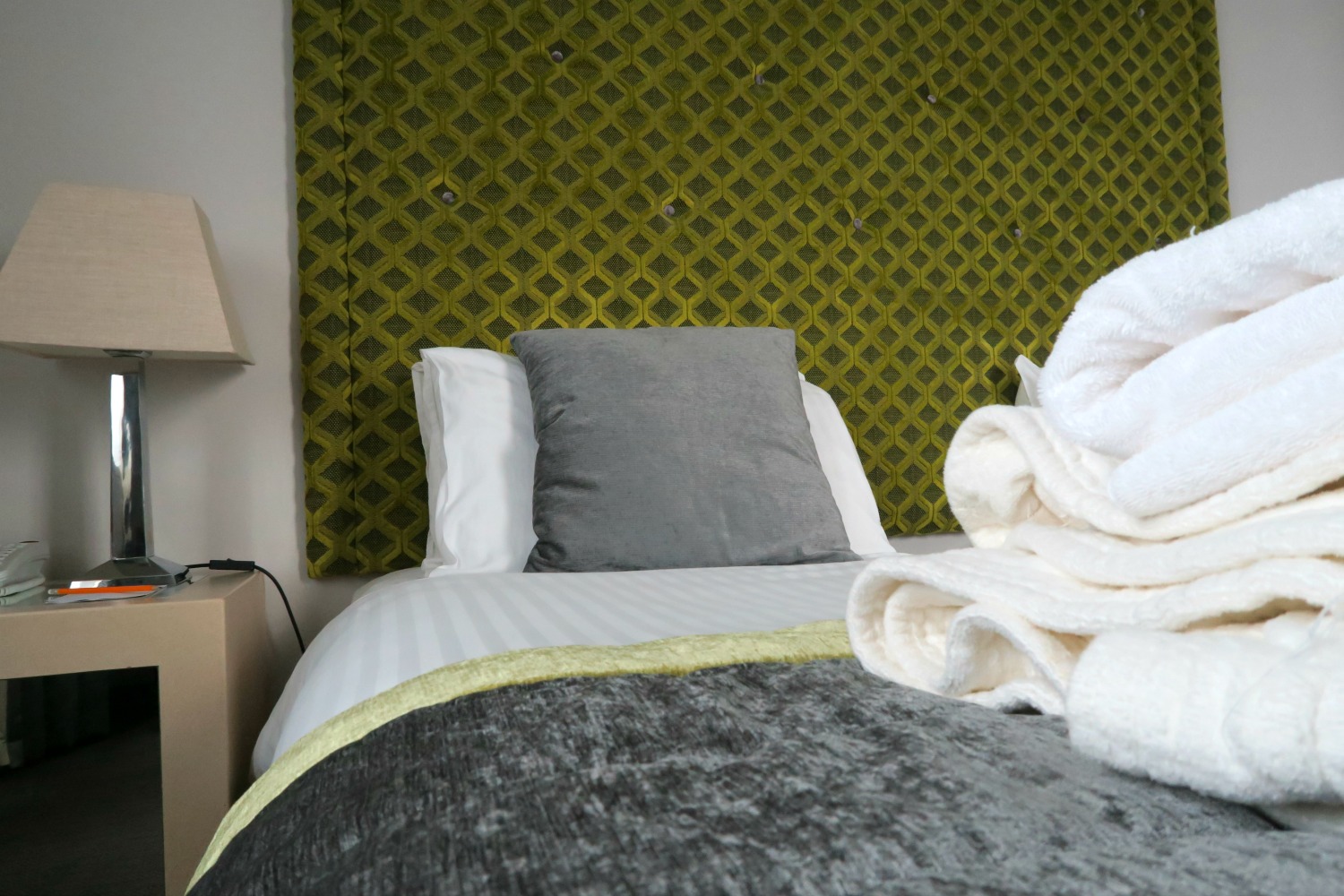 View of my robe piled on my bed - I review Malvern Spa Hotel Worcestershire
