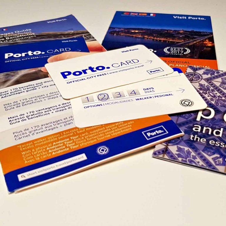 Image of two Porto card city passes and accompanying brochure plus city map - is the Porto card worth it? I look at whether you're likely to save money