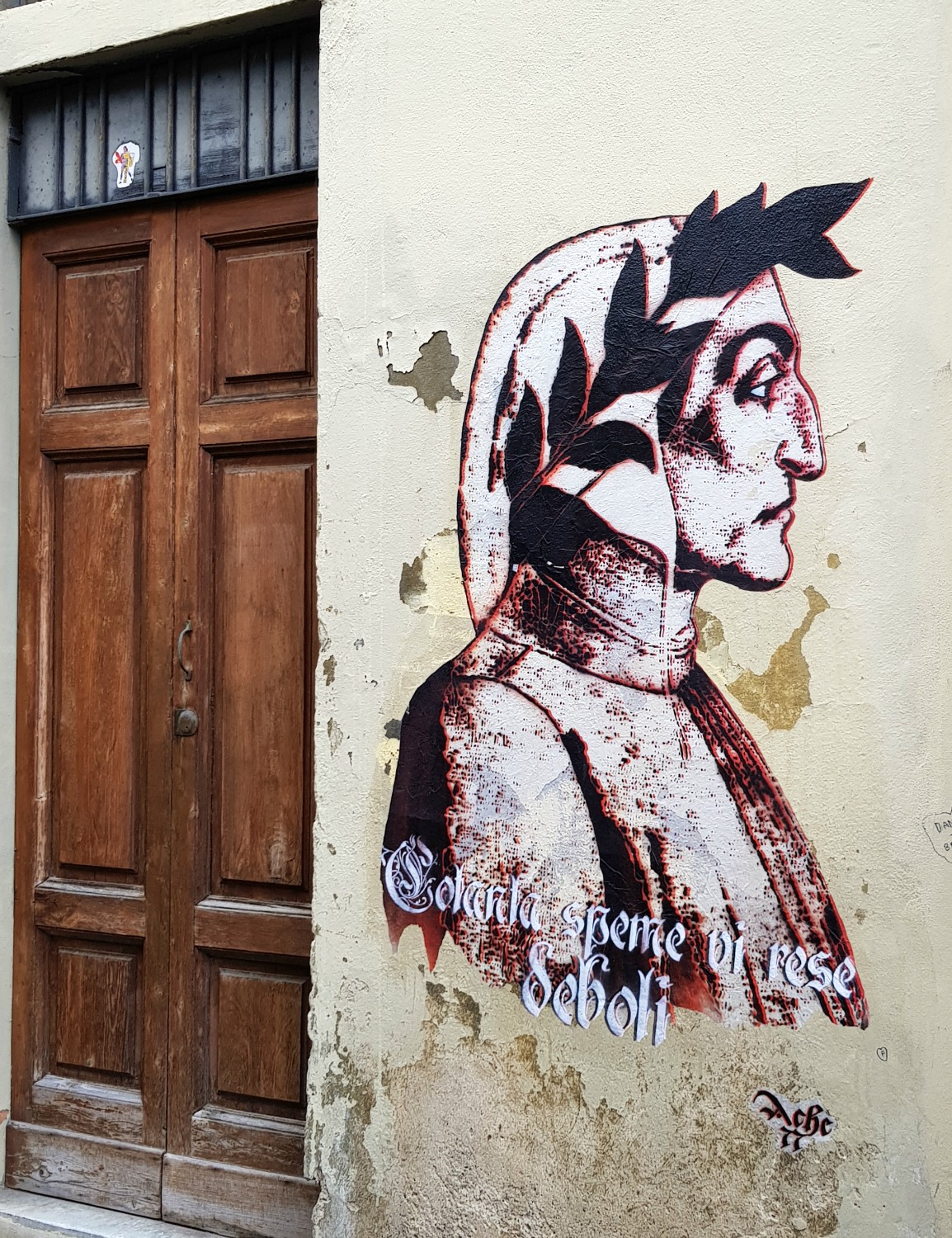 Street art in Florence, Italy, of a figure in traditional dress - my Uffizi tour with kids and gelato making day in Florence
