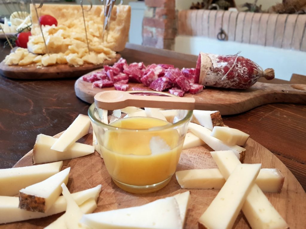 Cheese with honey as well as meat and cheese at Villa Le Capanne near Volterra in Tuscany - my review of the perfect big family villa in Tuscany, Italy