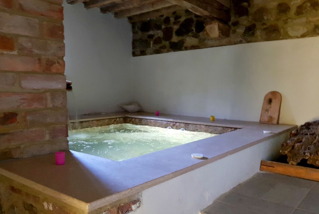 Hot tub at Villa Le Capanne near Volterra in Tuscany - my review of the perfect big family villa in Tuscany, Italy