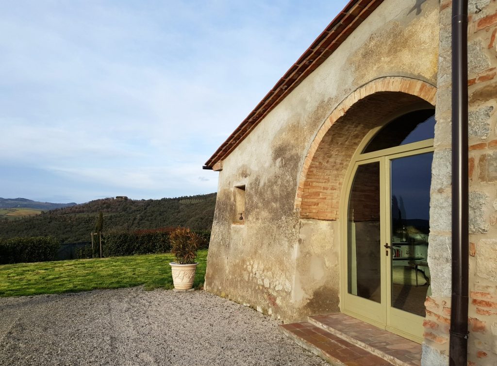 View of the corner of the old farmhouse, now Villa Le Capanne near Volterra in Tuscany - my review of the perfect big family villa in Tuscany, Italy