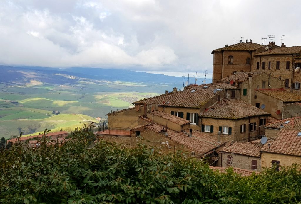 A view across to the rooftops of Volterra, not far from Villa Le Capanne in Tuscany - my review of the perfect big family villa in Tuscany, Italy