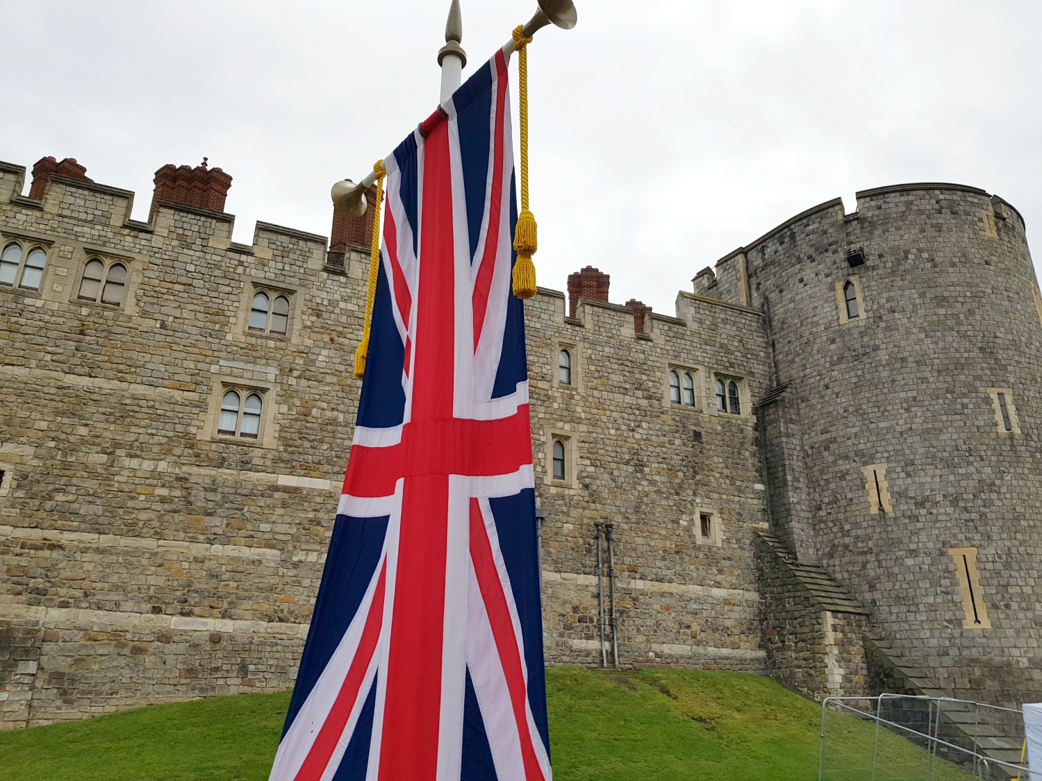 A view of the Union flag flying in front of Windsor Castle - hopping on to the  Windsor bus tour with kids