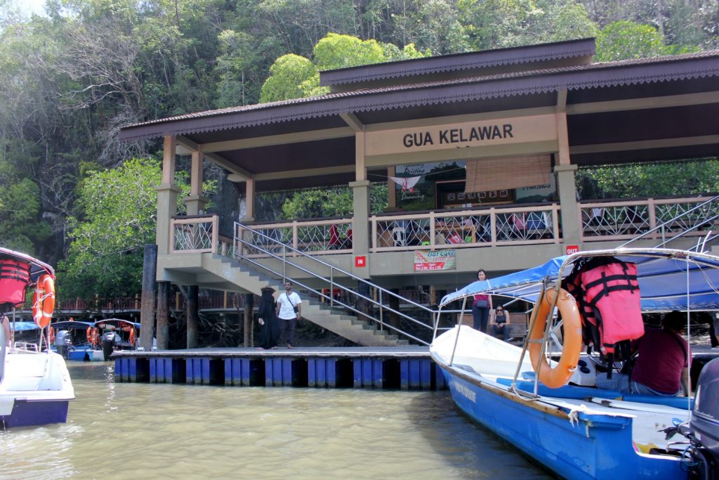 Boats at the dock for the bat cave in Langkawi as part of a tour through the mangroves - my top Langkawi tour with kids
