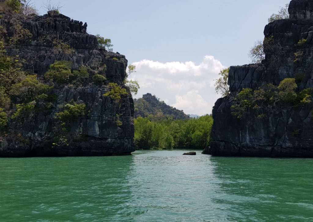 Gap between the karst rocks on the way to the open sea as part of a tour through the mangroves - my top Langkawi tour with kids