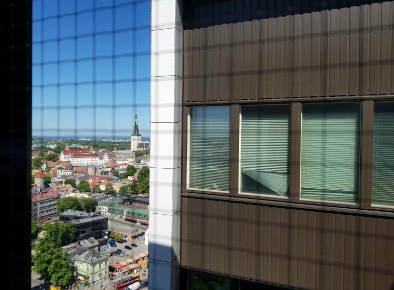 The view across to the 23rd floor of Hotel Viru in Tallinn, which officilly didn't exist, the Old Town spires in the background - my Tallinn KGB museum review after our visit to Estonia