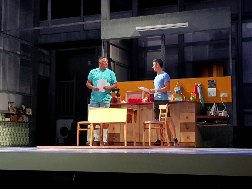 Learning about what goes on behind the scenes using the set from Everybody's Talking About Jamie on the stage at the Apollo Theatre during the preview for Kids Week London 2018, with discounts on children's tickets for West End shows