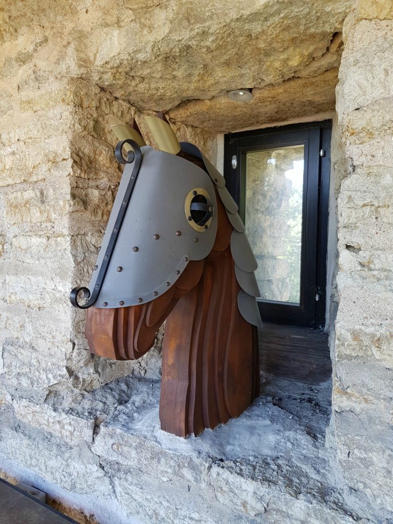 Wooden horse head with armour near Kiek in de Kok - the quirky details are one of the many reasons to visit Tallinn, Estonia