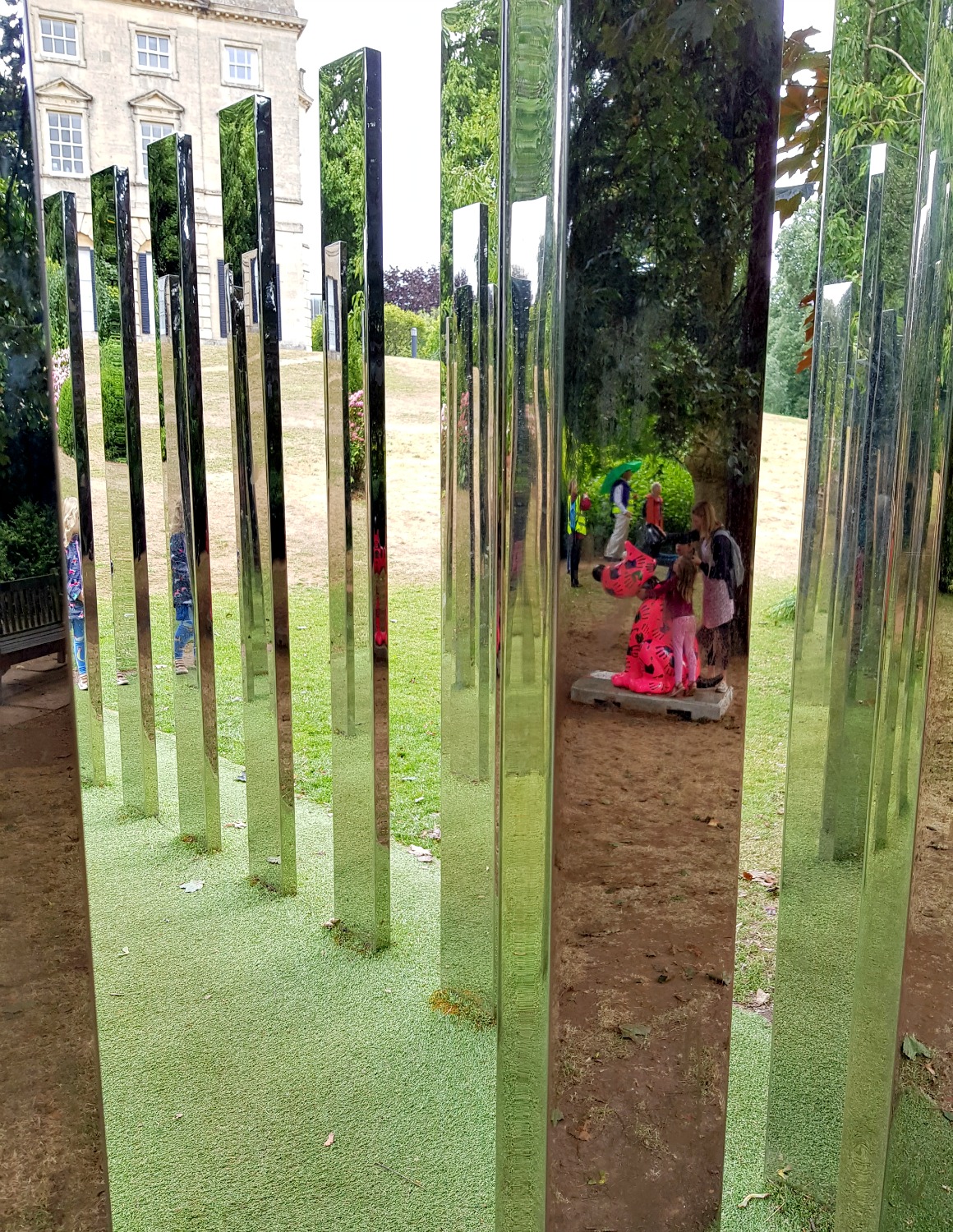 Mirror sculpture with one of the Gromit statues visible through the reflecting sections - following the Gromit Unleashed 2 trail in Bristol, our review