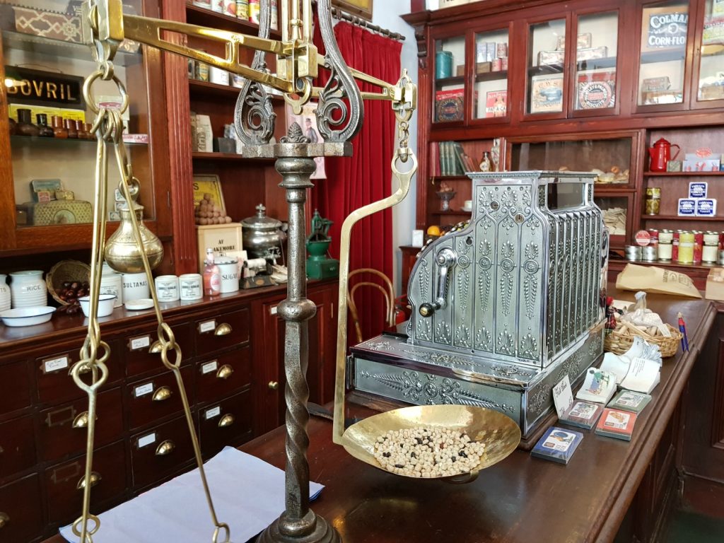 The old-fashioned cash register and scales at the grocer at the Victorian Town open air museum - my Blists Hill review for the family-friendly attraction in Ironbridge Gorge, Shropshire