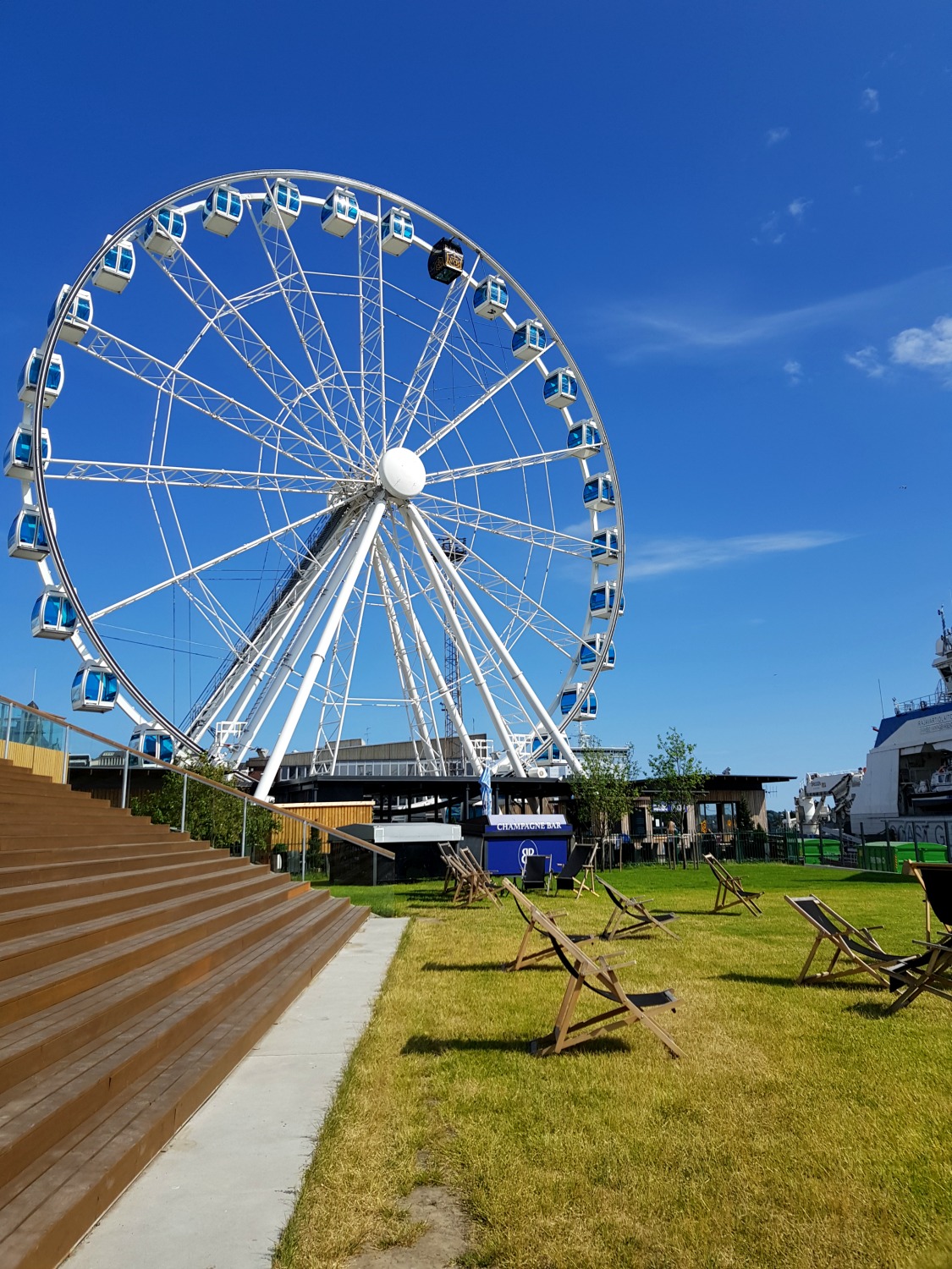 View over to the city's observation wheel in Helsinki - the architecture and chilled-out atmosphere is one of the top answers to the question why visit Helsinki?