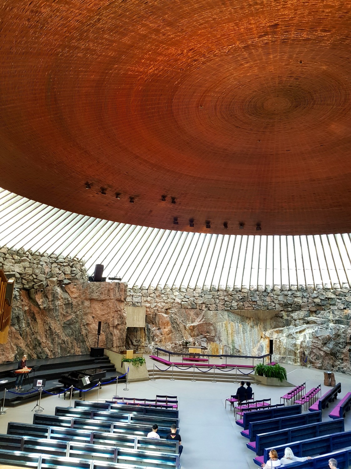 Interior of the unique rock church in Helsinki - the architecture is one of the top answers to the question why visit Helsinki?