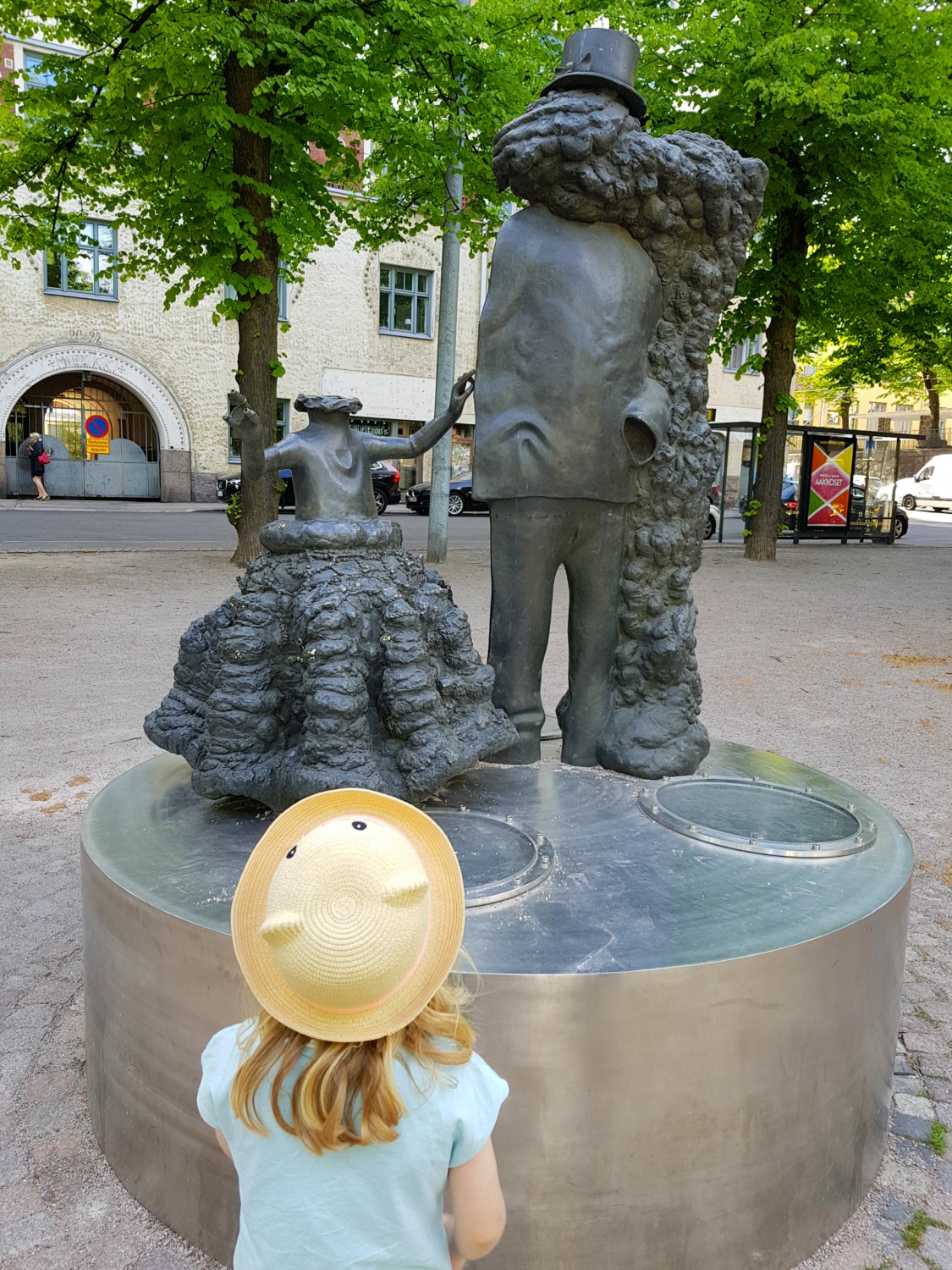 My daughter stares at one of the sculptures dotted around Helsinki - the quirky feel is one of my reasons to visit Helsinki